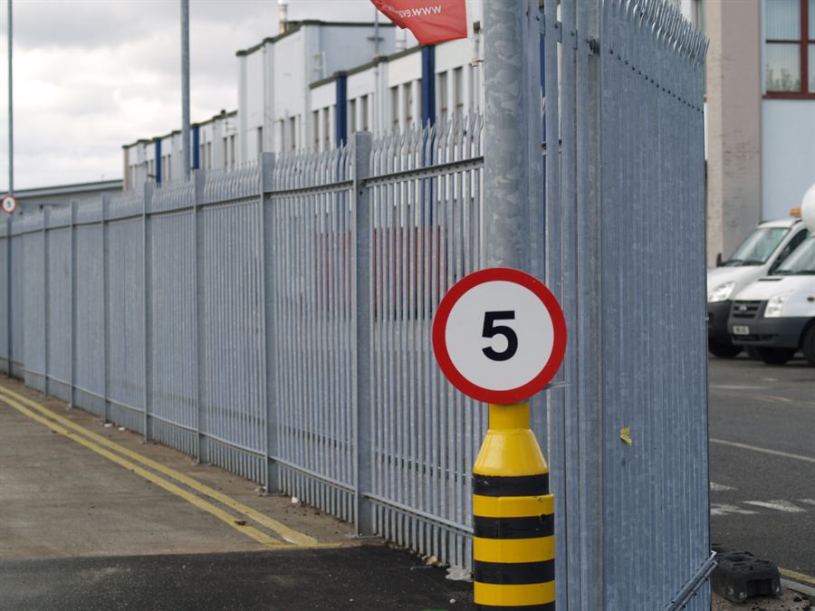 Galvanised palisade fencing installed along a footpath